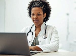 Doctor on laptop