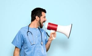 Nurse uses a megaphone to be heard