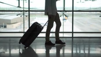 Travel nurse going through airport