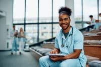 New nurse sitting in lecture hall